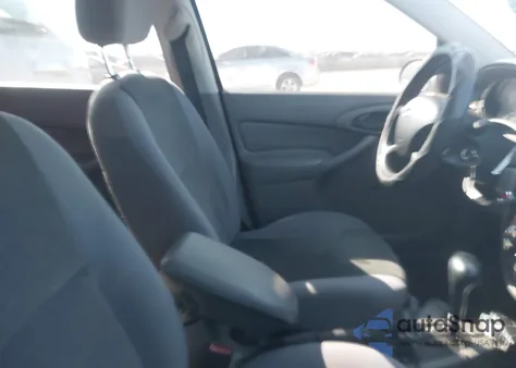 2003 Ford Focus Lx z USA, uszkodzony, nr VIN 1FAFP33P03W343530